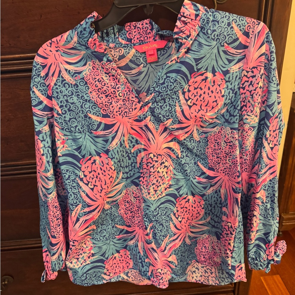 This long-sleeved, tropical-themed top is from Lilly Pulitzer size small